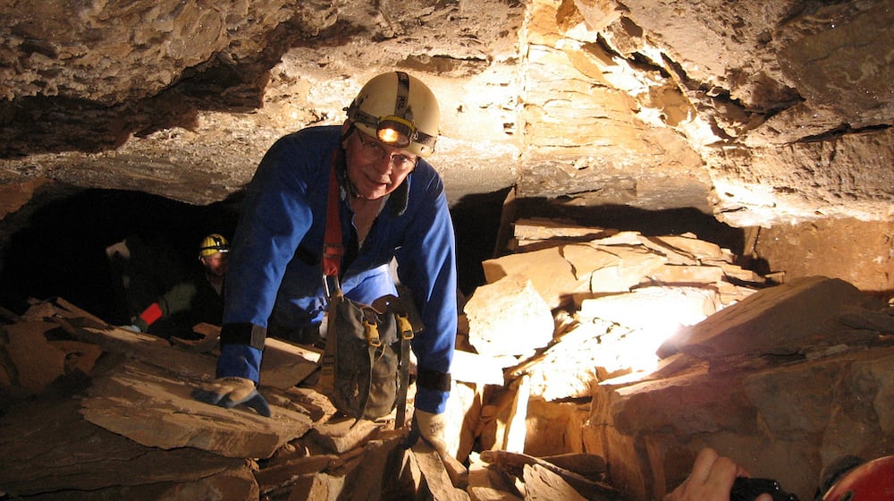 Caver Roger Brucker is pictured in Crystal Cave, which Floyd Collins discovered in 1917. 
ROBERT SEXTON/CONTRIBUTED